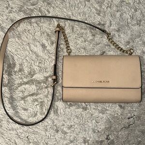 Michael Kors Saffiano Leather 3 in 1 Crossbody with strap.